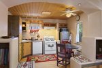 Warm and bright, fully equipped kitchen and dining area 